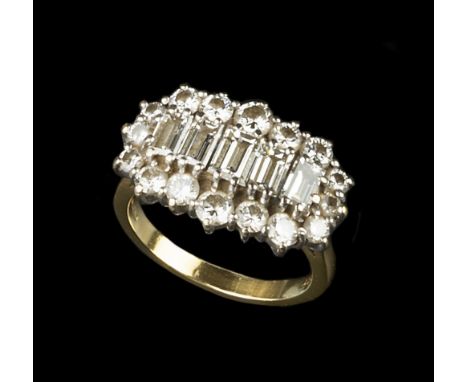 A DIAMOND CLUSTER RING, centred with a line of graduated baguette-cut diamonds in claw settings, bordered by a row of similar