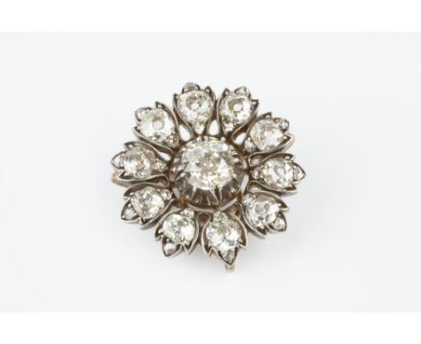 A DIAMOND CLUSTER PANEL BROOCH/PENDANT, designed as a flowerhead cluster of graduated cushion-shaped old-cut diamonds in pinc