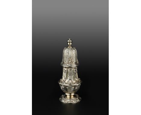 AN EDWARDIAN SILVER LARGE SUGAR CASTOR, ornately cast with panels of scales and basket weave, scallops and foliage, by Stones
