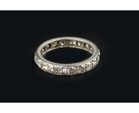 A DIAMOND FULL HOOP ETERNITY RING, set throughout with round brilliant and old-cut diamonds, white precious metal mounted, to