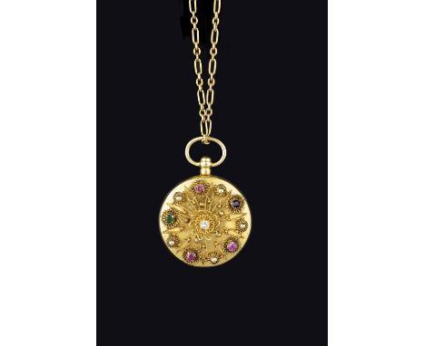 A DIAMOND AND VARI GEM-SET 'REGARD' LOCKET PENDANT, circa 1830-40, the circular hinged locket applied with a cannetille work 