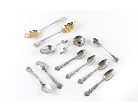 A PAIR OF GEORGE III SILVER TABLESPOONS, later embossed as berry spoons, by Peter &amp; Ann Bateman, London 1799, a set of si