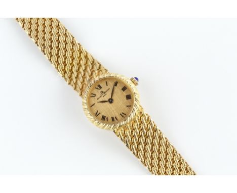 A LADY'S 18CT GOLD BRACELET WATCH BY BAUME & MERCIER, the circular textured gilt dial with black Roman numerals, to a jewelle