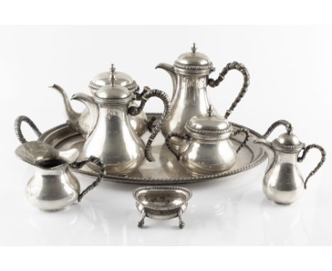 AN ITALIAN SILVER SIX PIECE TEA SERVICE, with baluster bodies and twist handles, comprising teapot, hot water pot, hot milk p