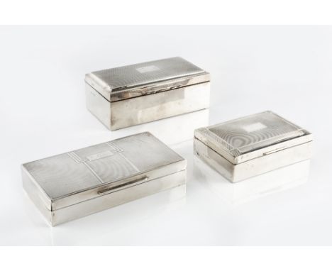 A SILVER RECTANGULAR CIGARETTE BOX, with engine turned decoration, by William Adams Ltd, Birmingham 1932, 16.5cm wide, and tw