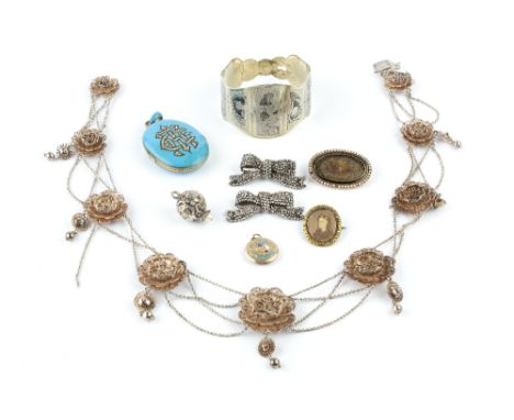 A COLLECTION OF ANTIQUE AND LATER JEWELLERY, comprising a white metal filigree panel necklace, a blue enamel locket pendant, 