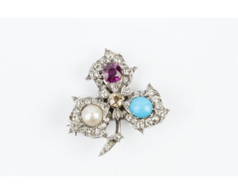 A DIAMOND AND VARI GEM-SET TREFOIL BROOCH/PENDANT, designed as a three-leaf clover of graduated old and single-cut diamonds, 