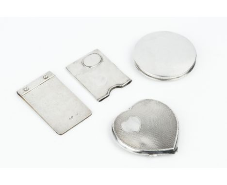 A SILVER HEART SHAPED COMPACT, with engine turned decoration, by Broadway & Co, Birmingham 1953, 8.3cm, another silver circul