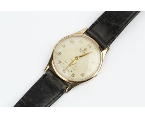 A GENTLEMAN'S 9CT GOLD 'PRECISION' WRISTWATCH BY ROLEX, the circular silvered dial with gilt Arabic numerals and subsidiary s