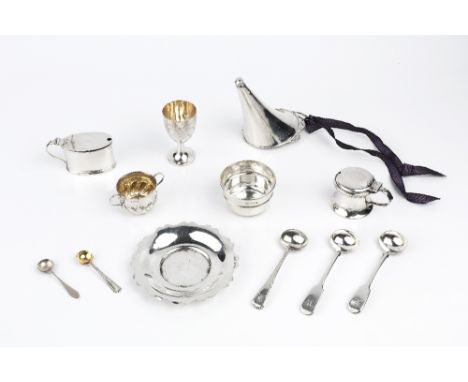 A SMALL COLLECTION OF SILVER, comprising a twin handled salt, London 1888, two mustards, a flared posy holder, Birmingham 191