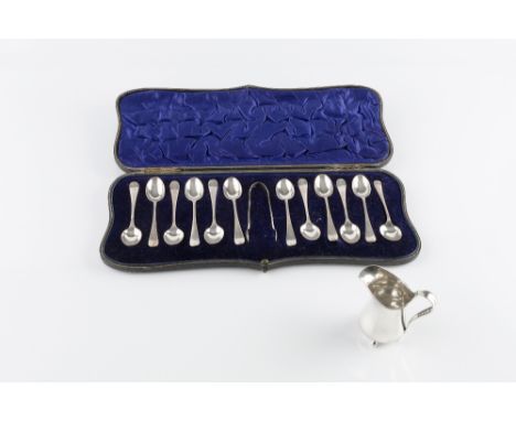 A SET OF ELEVEN EDWARDIAN SILVER OLD ENGLISH PATTERN TEASPOONS, with matching sugar tongs (and a further matched teaspoon), b