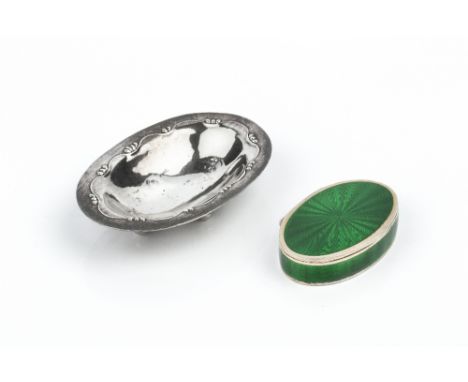 A DANISH SILVER OVAL SMALL DISH, by Georg Jensen, with simple embossed border, on ball feet, 7cm wide, together with a Contin