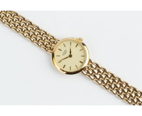 A LADY'S 9CT GOLD BRACELET WATCH BY ROTARY, the circular dial with baton markers, to a quartz movement and brick-link bracele