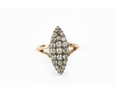 A DIAMOND PANEL RING, the navette-shaped panel of old, single and round brilliant-cut diamonds in grain settings, between bif