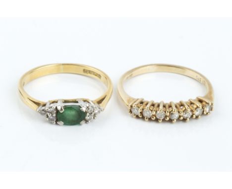 TWO DIAMOND SET RINGS, the first an emerald and diamond dress ring, 18ct gold mounted, the second a diamond half hoop ring, 9