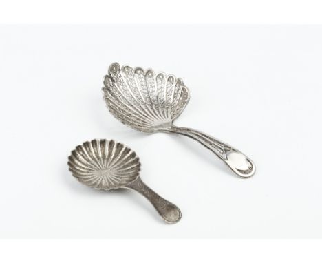 A GEORGE IV SILVER CADDY SPOON, with lobed circular bowl and bright cut handle, by Ledsam & Vale, Birmingham 1822, 6cm long; 