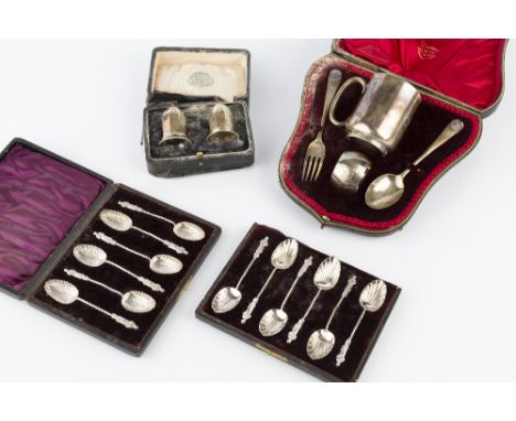 A LATE VICTORIAN SILVER CHRISTENING MUG, napkin ring, fork and spoon, by Josiah Williams &amp; Co., London 1898, in fitted ca