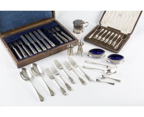 A SILVER SPOT HAMMERED CHRISTENING FORK AND SPOON, Sheffield 1921, a pair of silver peppers, 5oz, a part set of silver handle