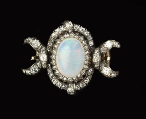 A LATE 19TH CENTURY OPAL AND DIAMOND BROOCH/CLASP, centred with an oval cabochon opal and rose-cut diamond cluster, within an