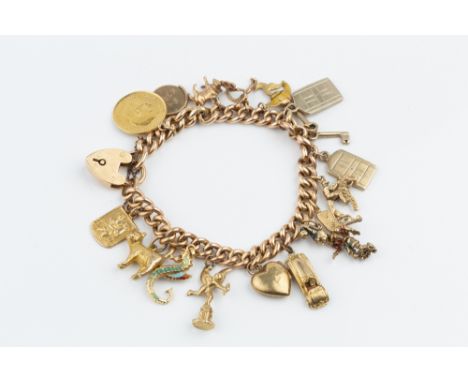 A CHARM BRACELET, the hollow curb-link bracelet stamped '15', with 15ct gold padlock clasp hallmarked for Birmingham 1906, su