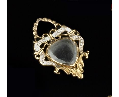 A 19TH CENTURY ROCK CRYSTAL AND ENAMEL MEMORIAL/SWEETHEART LOCKET PENDANT, the scrolled openwork panel with white enamel insc