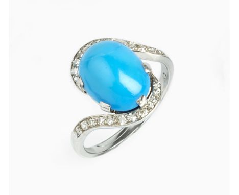 A DIAMOND SET DRESS RING, of crossover design, the oval turquoise coloured cabochon claw set between single-cut diamond set s