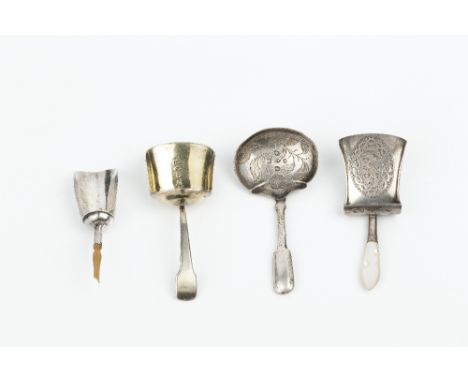 A GEORGE III SILVER CADDY SPOON, of shovel form, with engraved decoration and mother of pearl handle, by William Pugh, Birmin