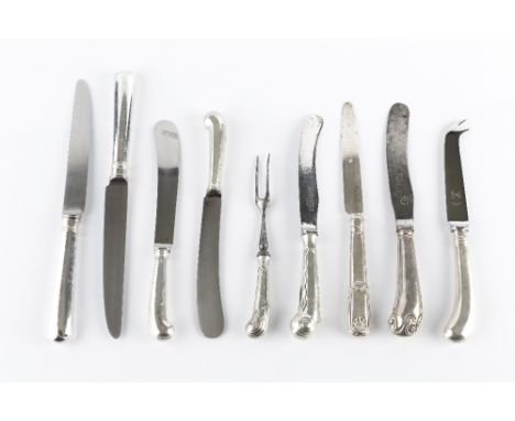 A SET OF SIX MODERN SILVER HANDLED TABLE KNIVES, with six matching dessert knives, with steel blades, by C.J. Vander Ltd, She