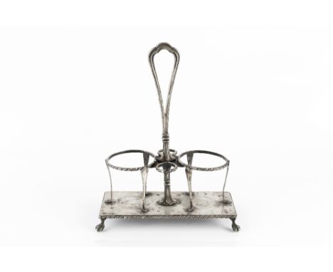 AN ITALIAN SILVER DECANTER STAND, the rectangular base with ropetwist edge, central handle and divisions for two decanters an