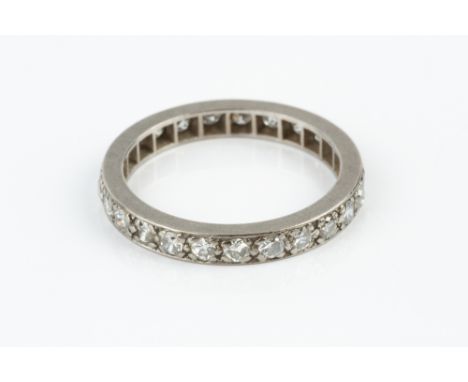 A DIAMOND FULL HOOP ETERNITY RING, set throughout with old and Swiss-cut diamonds, white precious metal mounted, total diamon