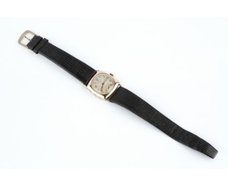 A 9CT GOLD CASED WRISTWATCH BY ROLEX, the circular dial with Arabic numerals and subsidiary seconds dial, to a jewelled manua
