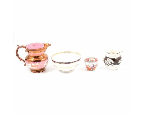Castleford type jug, moulded with a hunting scene, against a chocolate brown ground, 10cm; a pink and copper lustre jug; Crea