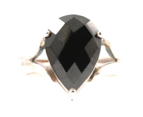 Gemporia - A black spinel necklace, the faceted 20mm drop shape spinel (20.700 carats) attached to a silver chain, 45cm long;