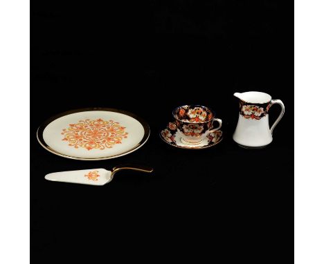 A Royal Albert 'Heirloom' pattern part teaset, comprising 9 cups, 10 saucers, 12 tea plates, milk jug and sugar basin, 2 sand