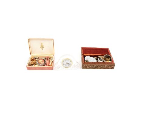 A white metal Jerusalem souvenir compact, marked 833; a white metal cross pendant, marked silver, on a white metal chain, mar