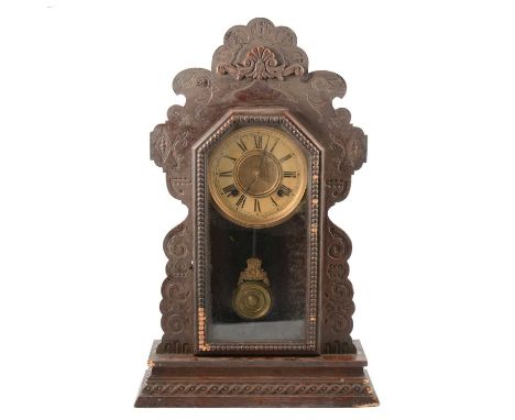 American 'Gingerbread' press moulded shelf clock, the case scuffed/damaged, glazed door, circular dial, Ansonia movement, 57c