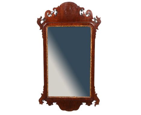 Chippendale inspired mahogany pier glass, fret cut outlines, bevelled plate and gilt slip, 77x43cm.