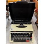 A cased Brother vintage typewriter COLLECT ONLY