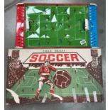 A vintage Chad valley boxed football game (No balls)