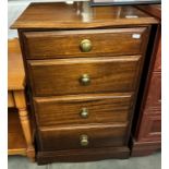 A dark wood stained 4 drawer chest with patinated brass handles COLLECT ONLY