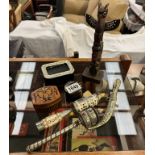 A small miscellaneous lot of native souveniers including Canadian Totum, Himalayan prayer sticks &