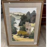 A large watercolour of a church tower beside water in the hillside