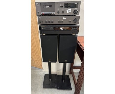 A NAD stereo amplifier 3020,Cassette deck 6220, Marantz CD-41 compact disc player &amp; A pair of Celestion DL4 speakers on s