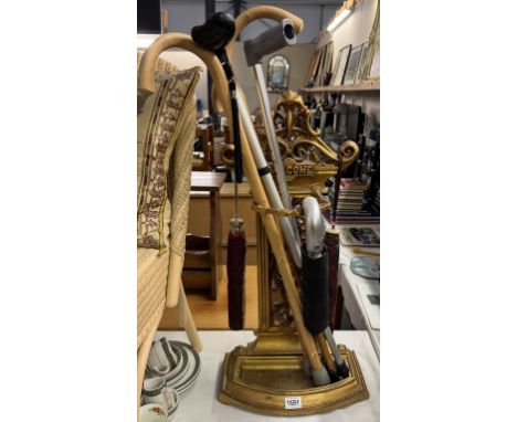 An umbrella/stick stand, includes some umbrellas &amp; sticks COLLECT ONLY