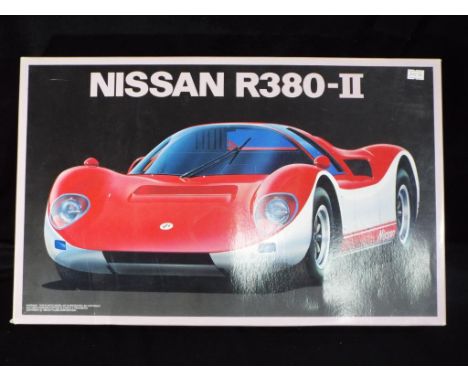 Fujimi - A boxed Fujimi !;16 scale Nissan R380-II model kit. The kit is a Excellent sealed box with some minor storage wear a