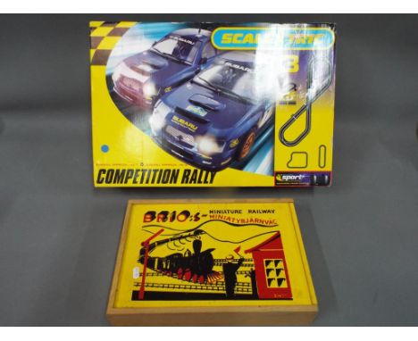 Scalextric; Brio - A boxed Scalextric #3 Competition Rally Set; together with a boxed Brio Miniature Wooden Railway set. Both