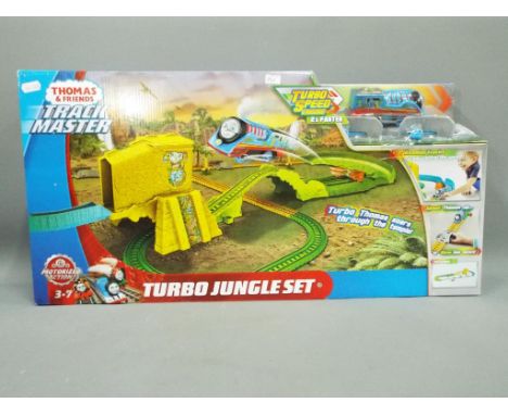 Thomas The Tank Engine - A boxed Thomas the Tank Engine &amp; Friends Turbo Jungle Set. The 20 piece childrens playset set is