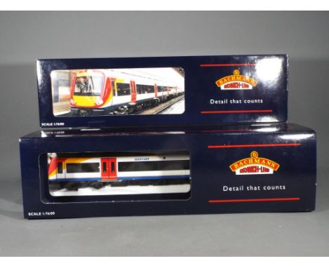 Bachmann - A boxed Bachmann 32-452 OO Gauge Turbostar 2 Car DMU Set in South West Trains livery. Models appear to be in Mint 