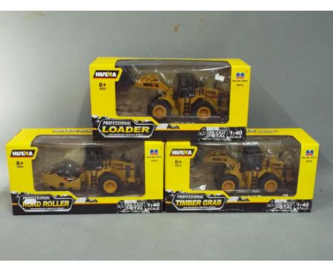 Huina - Three boxed Huina 1;40 scale diecast model construction vehicles. Lot consists of #1913 Loader; #19014 Timber Grab; a