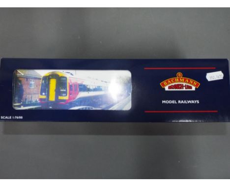 Bachmann - A boxed Bachmann Class 159 OO Gauge 3  Car DMU Set 31-513A in 'Arriva' Trans Pennine Express livery. All 3 models 